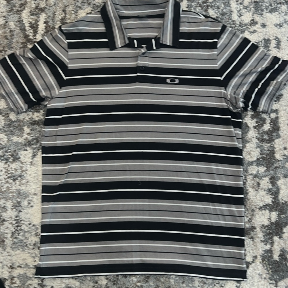 Oakley collar shirt! Excellent condition! No stains or tears.